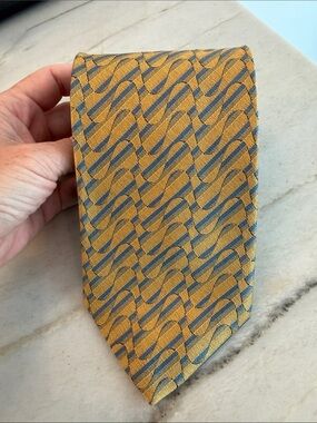 XMI Gold silk Tie with Blue Wave Pattern